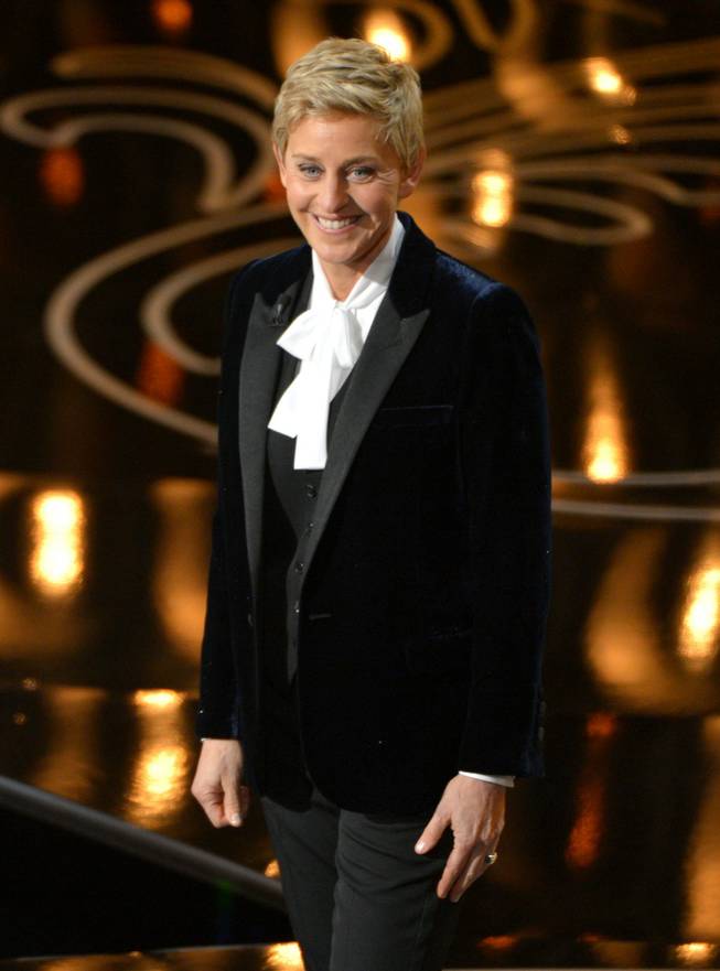 Ellen DeGeneres hosts the Oscars at the Dolby Theatre on Sunday, March 2, 2014, in Los Angeles.  (Photo by John Shearer/Invision/AP)